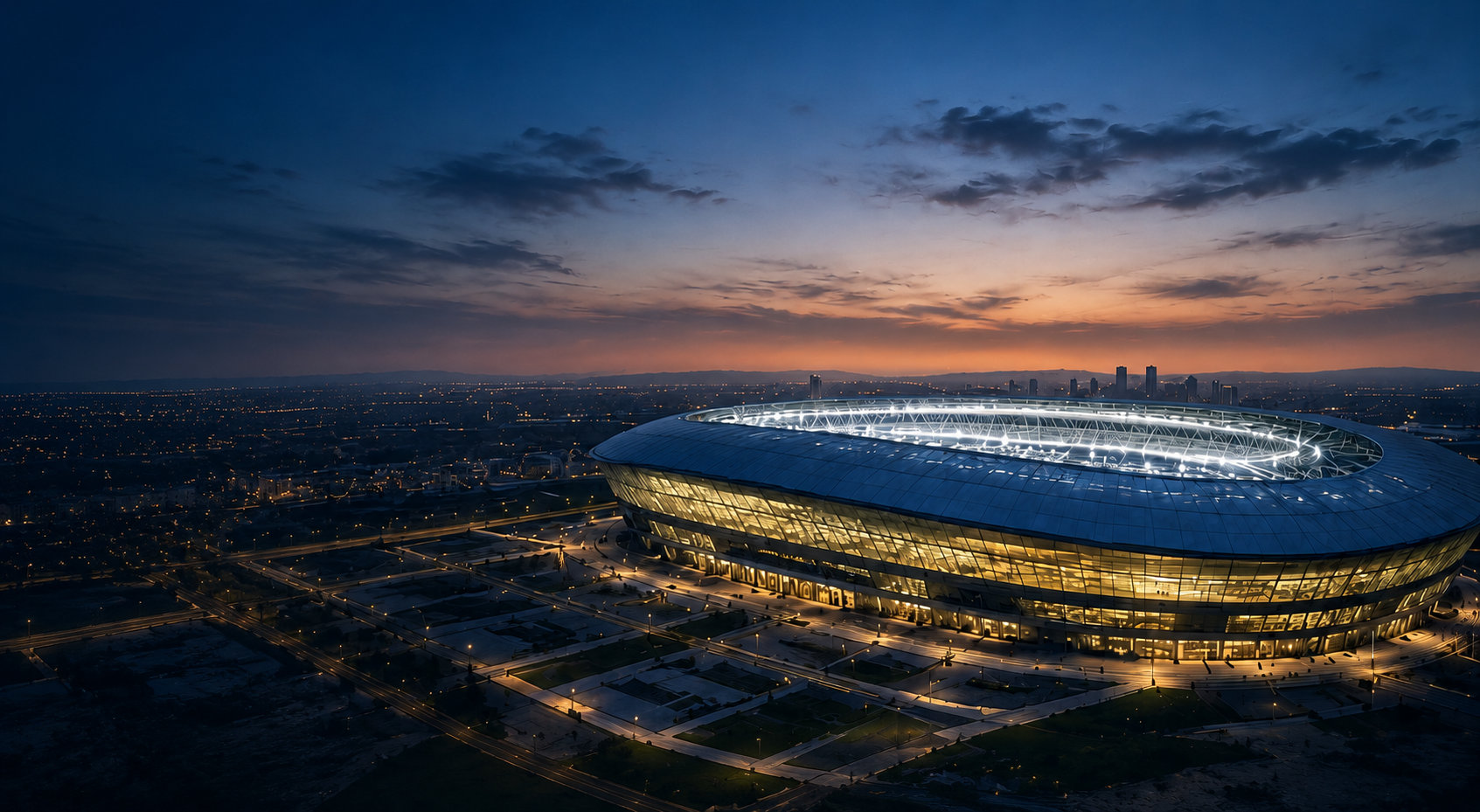 Floodlit stadium at dusk